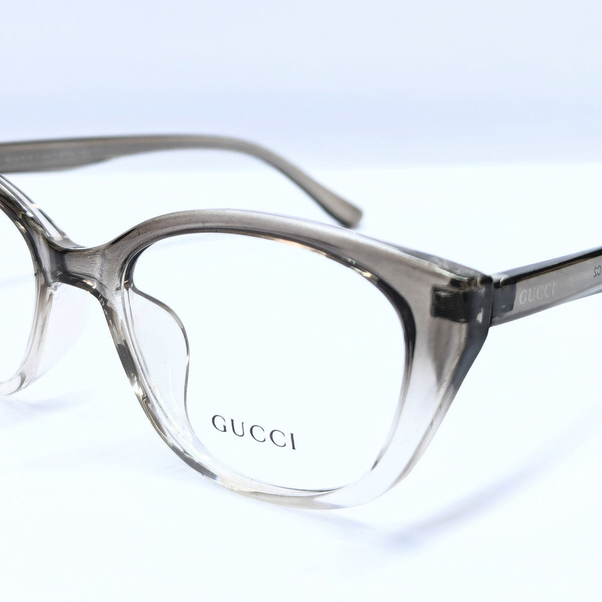 Gucci cats eye translucent smoky brown
