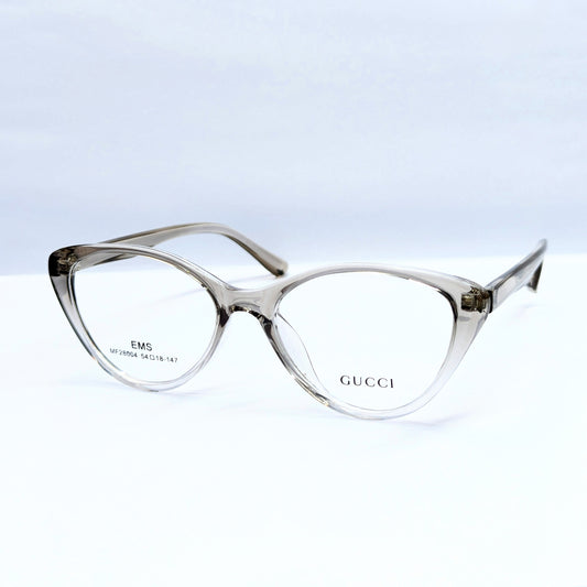 Gucci cat-eye eyeglasses in a translucent smoky gray acetate