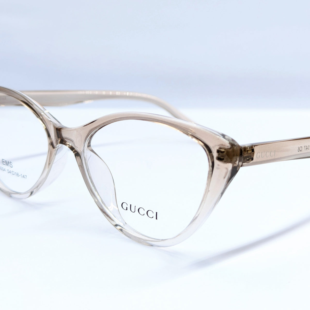 Gucci CATS EYE  translucent smoky brown