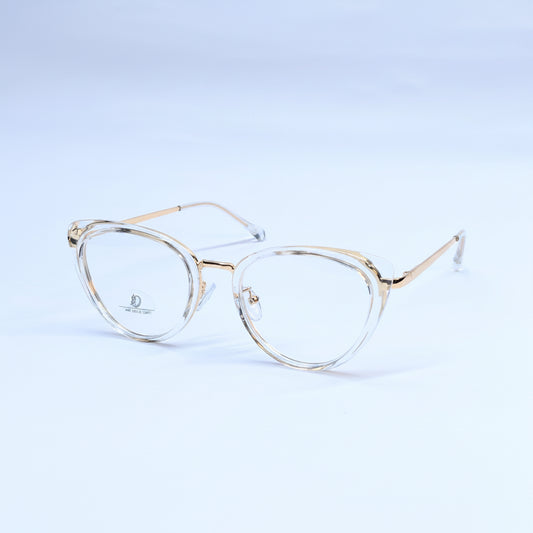 Oversized oval eyeglasses with a clear acetate frame and gold metal rims, displayed on a light blue gradient background.