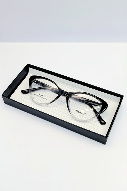 GUCCI CATS EYE BLACL AND WHITE SHADE