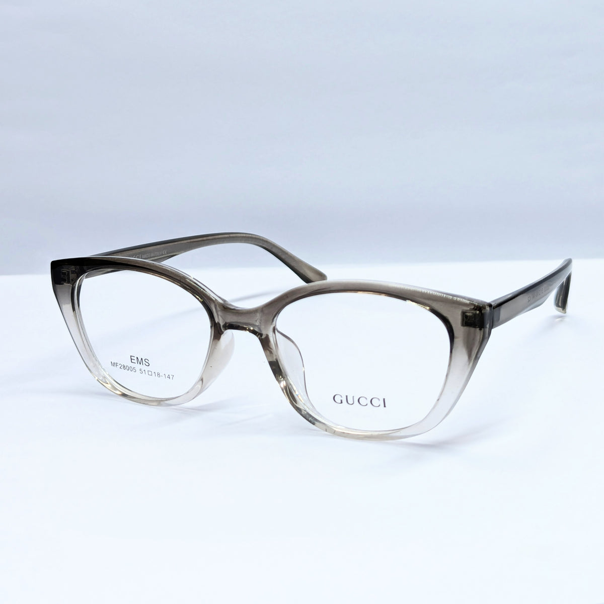 Gucci cats eye  translucent smoky brown