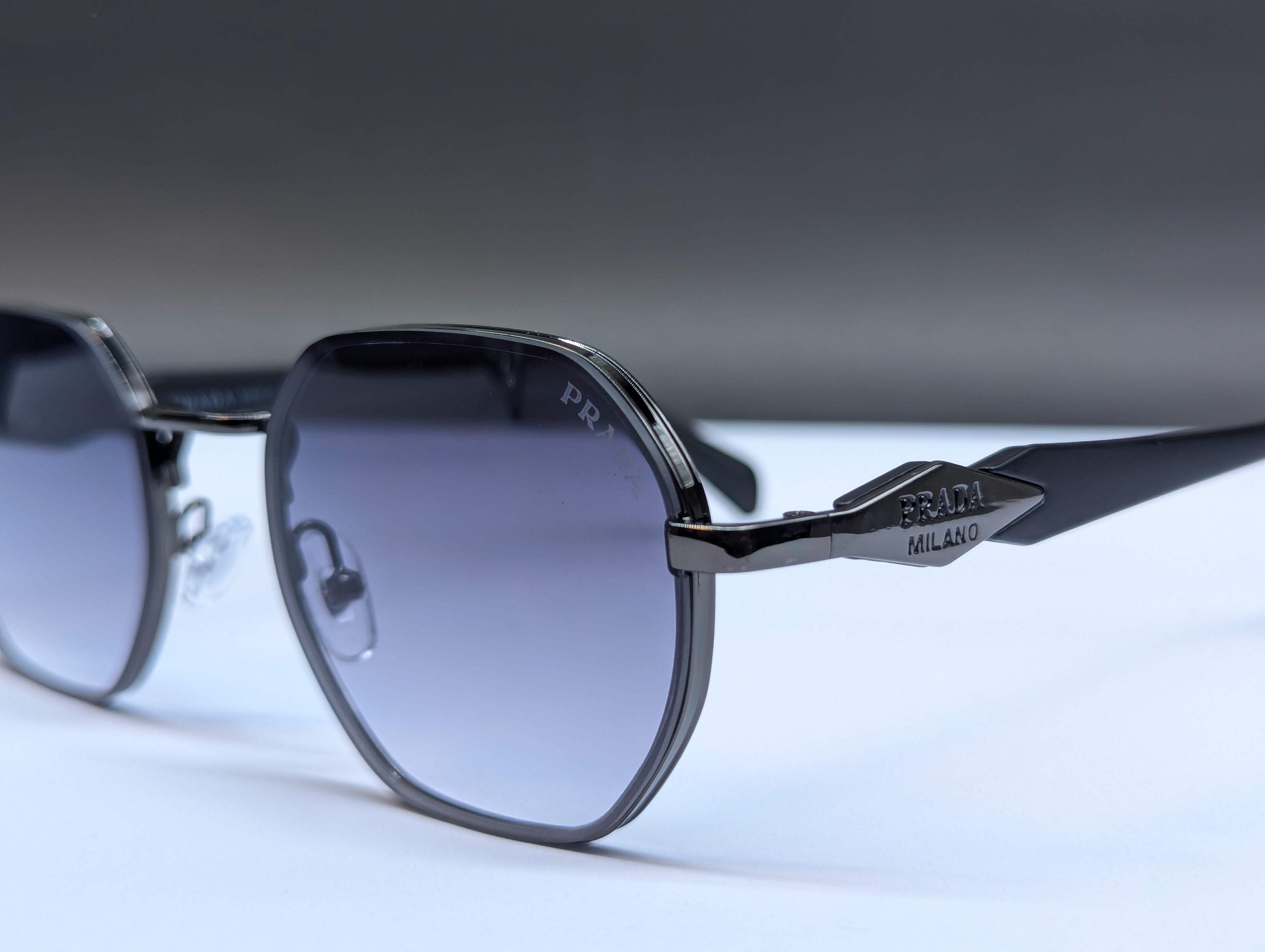 PRADA OVAL SHAVE SUNGLASS