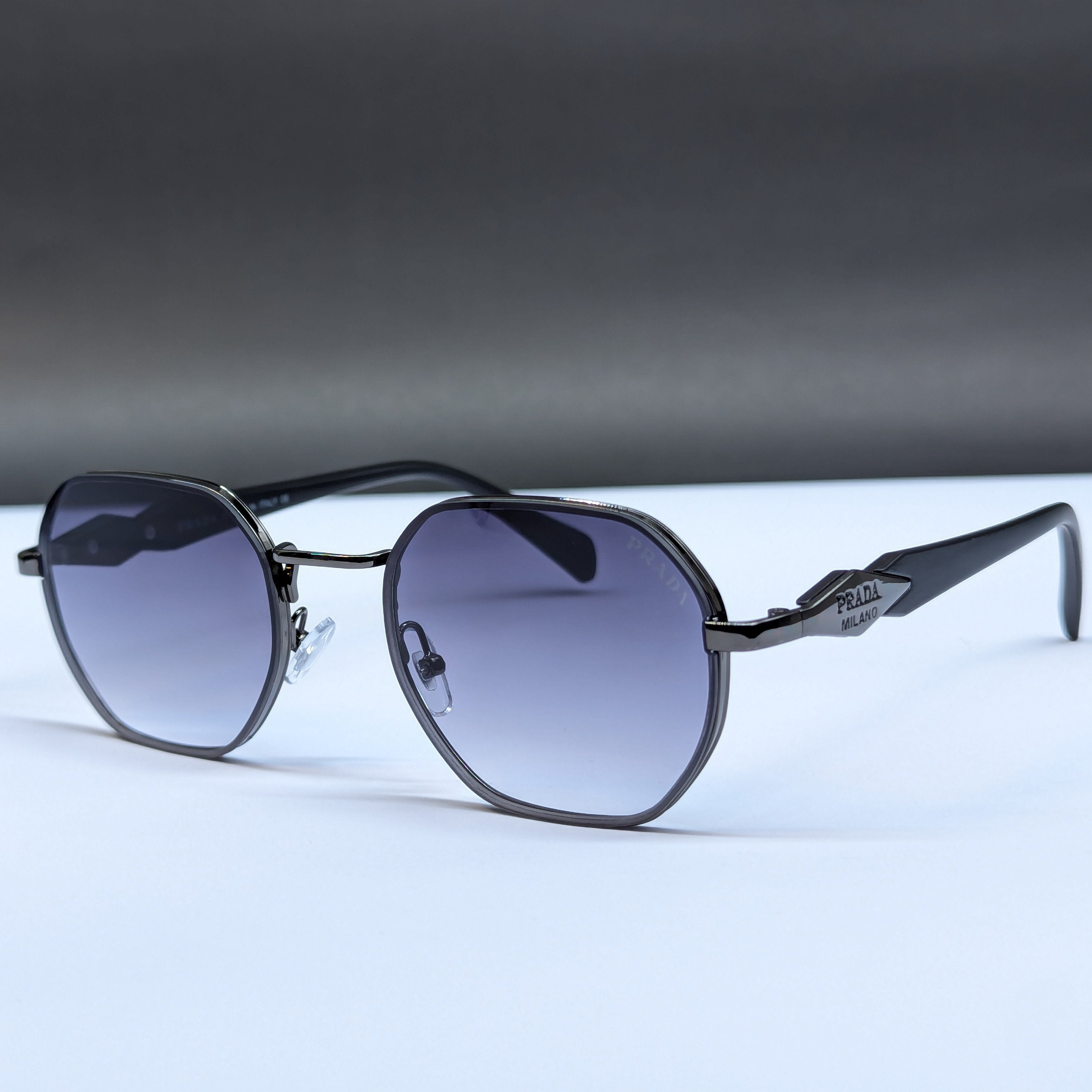PRADA OVAL SHAVE SUNGLASS