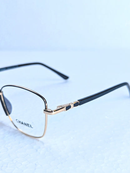 CHANEL GOLD AND BLACK SHADE