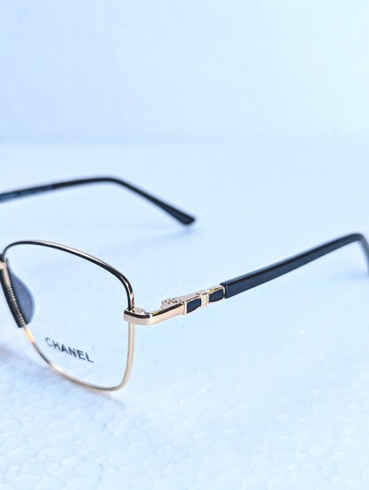 CHANEL GOLD AND BLACK SHADE