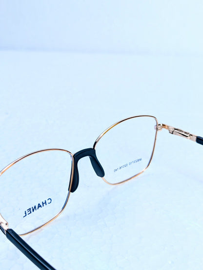 CHANEL GOLD AND BLACK SHADE