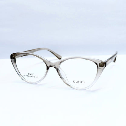 Gucci cat-eye eyeglasses in a translucent smoky gray acetate